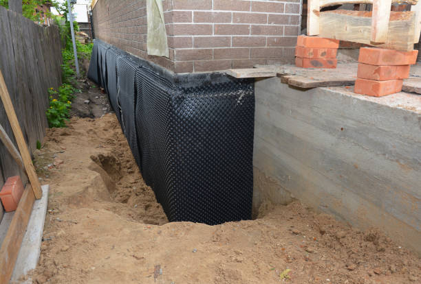 Happy homeowners after waterproofing job in Valley Center